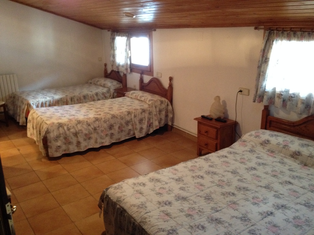 Habitación familiar cuádruple con camas confortables en Vilaller